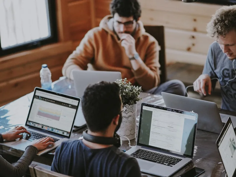 Multi-generational team collaborating in a modern workplace